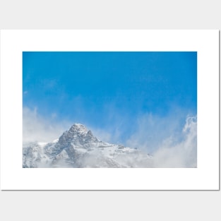 Snow winds on mountain top Posters and Art